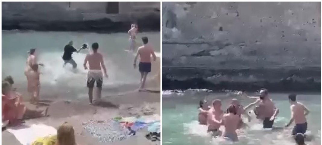 VIDEO-Rissa sulla spiaggia di Posillipo, colpisce bagnante con un casco