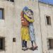 Street Art: Laika inaugura murale a Lampedusa in collaborazione con Amnesty Italia