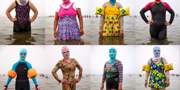 Caldo record in Cina, in spiaggia spopola il “facekini”