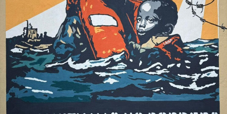A Riace il nuovo murale di Laika a sostegno del modello di accoglienza di Mimmo Lucano