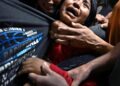 La foto della famiglia separata dall’ICE vince il World Press Photo 2026